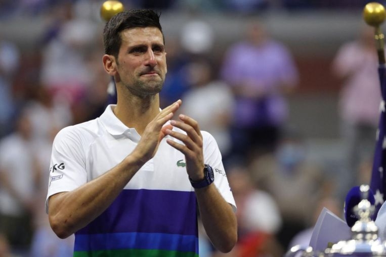 tennis: djokovic tearful but feels &#039;relief&#039; after bid for